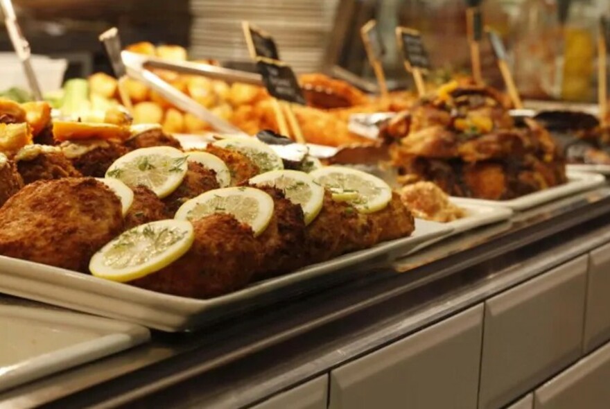 Two trays of food.