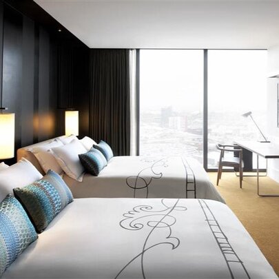 A twin bed room at Crown Metropole.