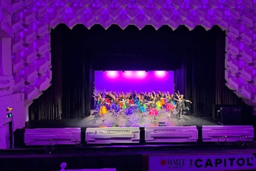 A colourful tap dancing troupe perfoming on stage at The Capitol.