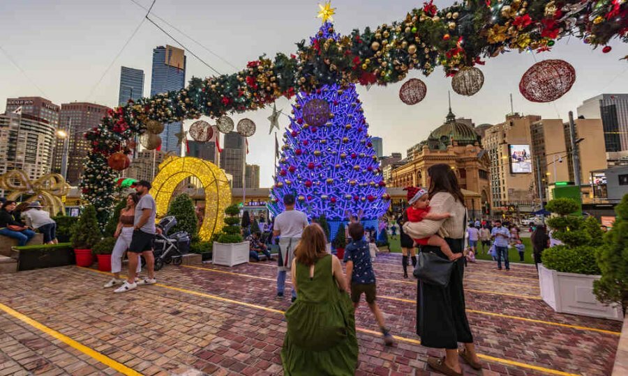 A group of friends with kids at a Christmas event