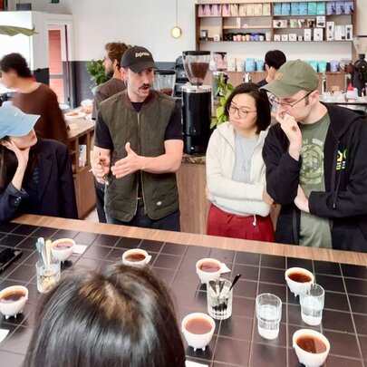 A group of people learning about coffee.