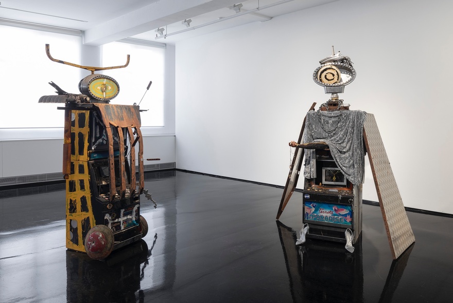 Installation view of an exhibition of  sculptures by the Australian artist collective Tennant Creek Brio, known for repurposing found objects into art. 