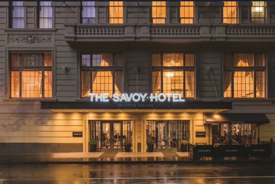 Front facade of the Savoy Hotel on Little Collins Street, highlighting its palazzo architectural style.