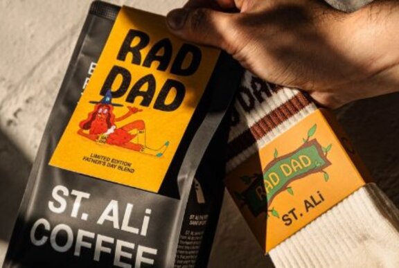 Coffee beans and socks with labels that read 'rad dad'.