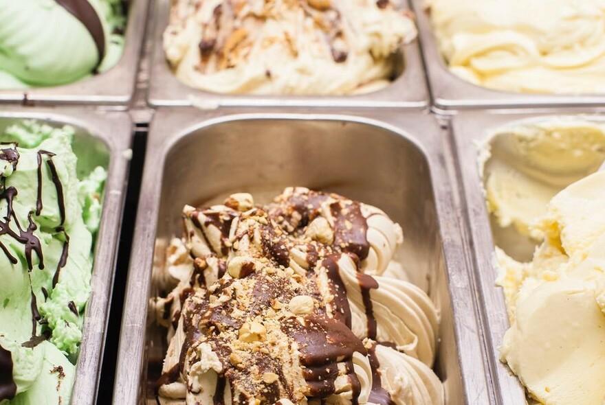 Trays of gelato, various flavours.