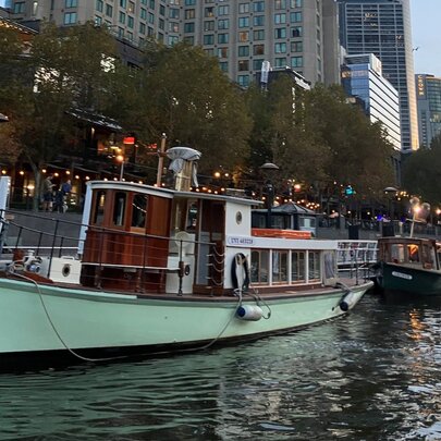 A green bottomed steam boat moored at Southbank on the Yarra River