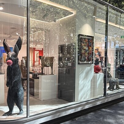 The display window of the French-originated Gallery Got, with a large bronze standing rabbit in the corner.