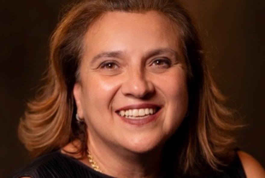 Portrait of a smiling woman.