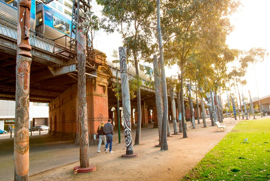 Aboriginal art installation using original wharf poles at Enterprize Park.