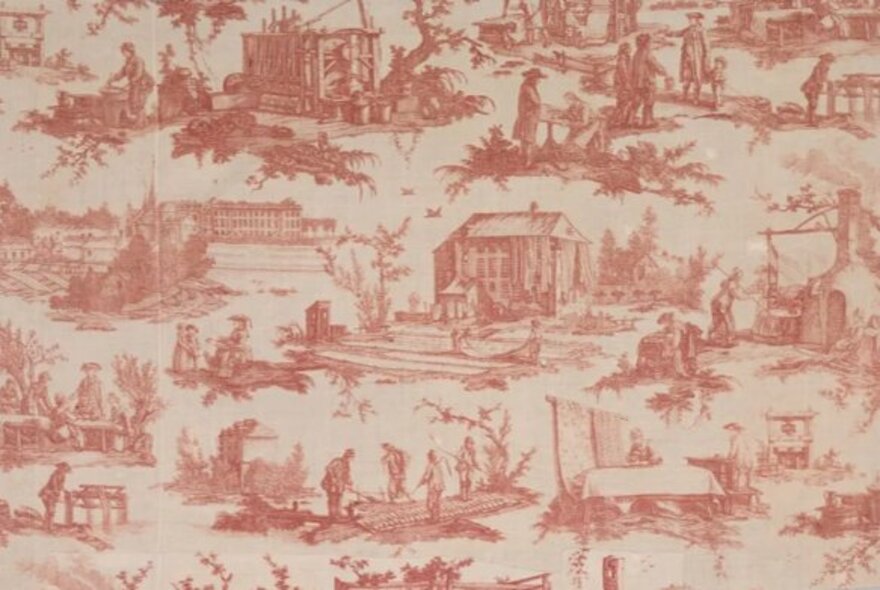 Detail of antique printed textile with red figures and buildings on cream background.