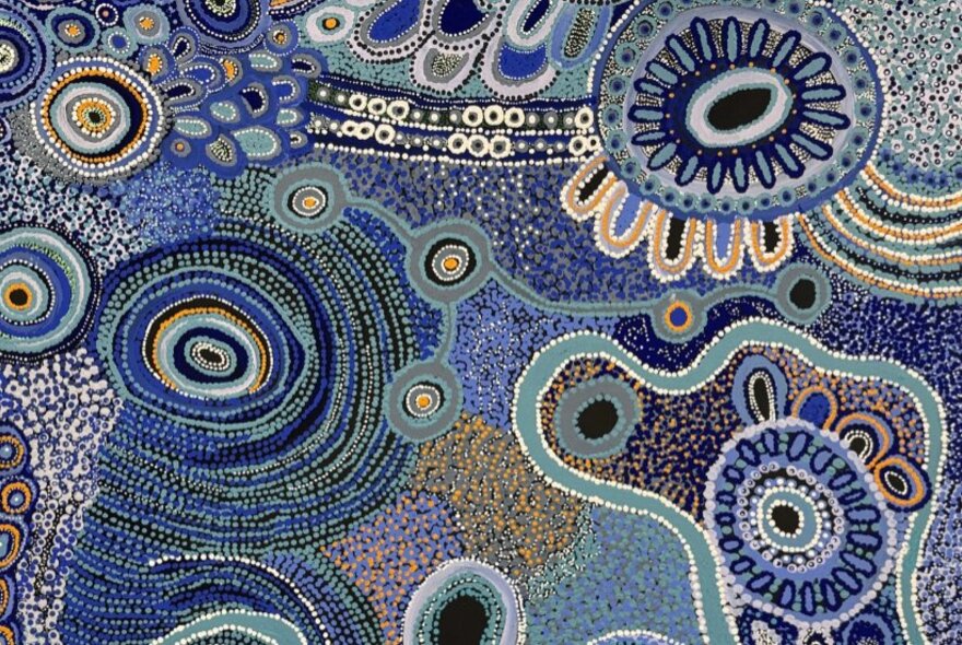 Blue toned First Nations traditional painting.