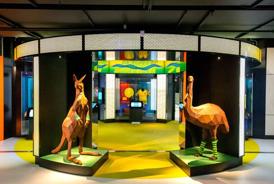 Museum displays featuring a kangaroo and emu wearing sports socks.