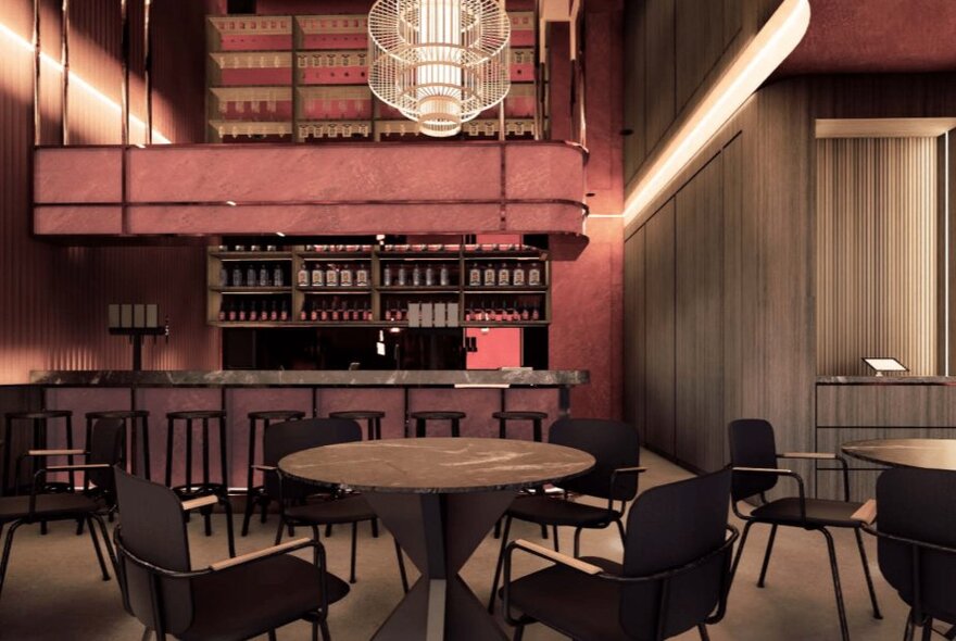 A cocktail bar interior with black furniture and deco-style bar.