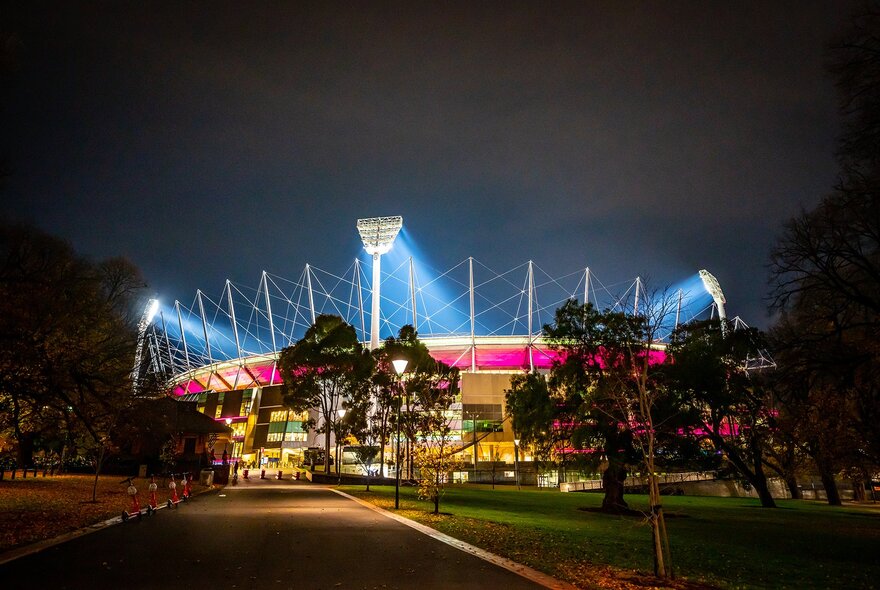 The MCG lit pink at night.