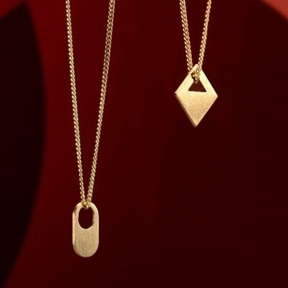 Two gold necklaces.