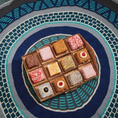 A box of a dozen lamingtons.