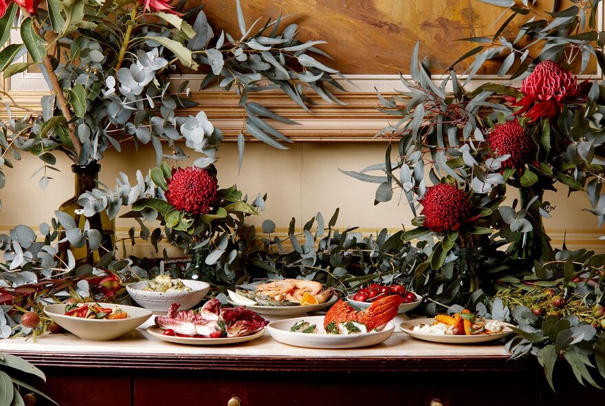 A festive Christmas table with an Australian theme including gum please and warratahs. 