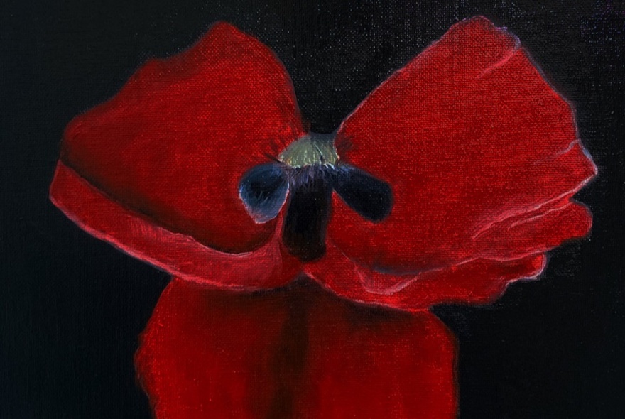 Detail of a painting of red flowers petals against a dark background.
