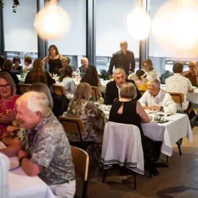 Patrons dining in a restaurant.
