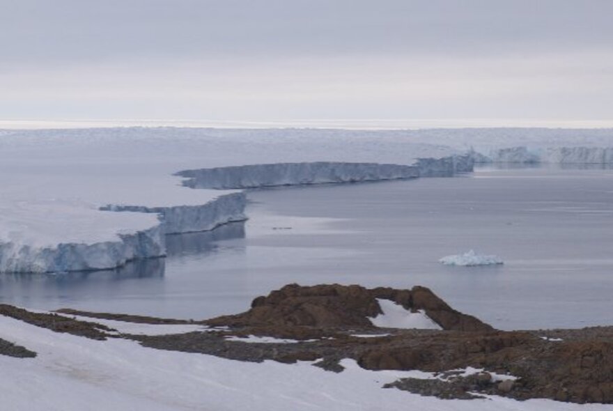 Still from a video by Polly Stanton, of an ice shelf and the sea at the Antarctic.