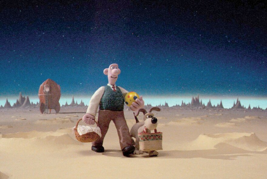 A still image from the short film Wallace and Gromit – A Grand Day Out, showing the two leads walking across the surface of the moon with their rocket ship behind them. 