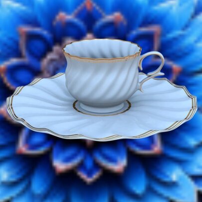 Cup and saucer floating over a blue flower.