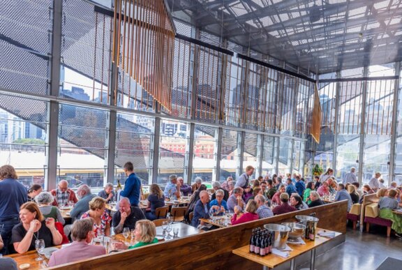 A group of people in a restaurant.