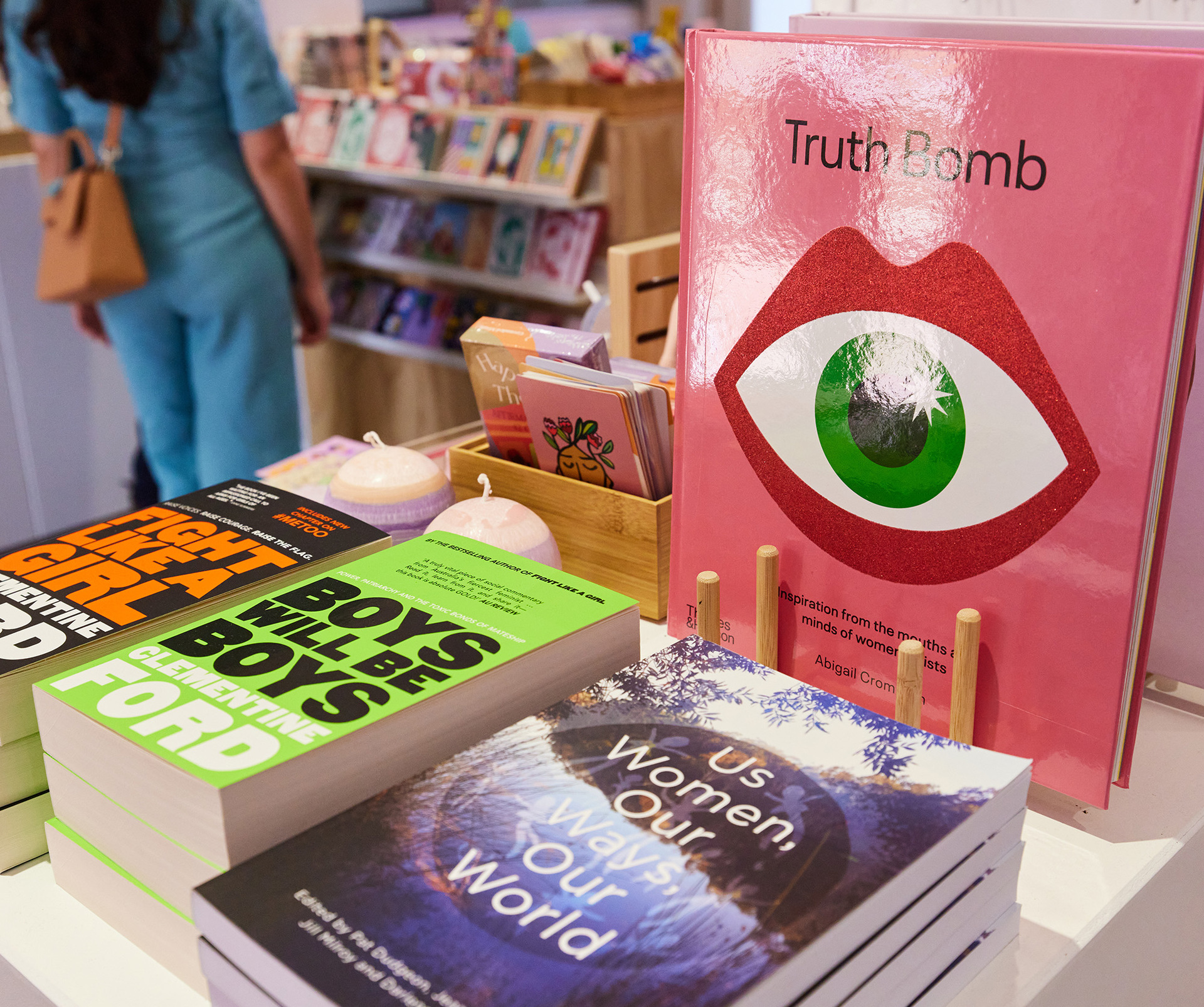A selection of books in a shop with titles like Truth Bomb, Boys Will be Boys and Fight like a Girl