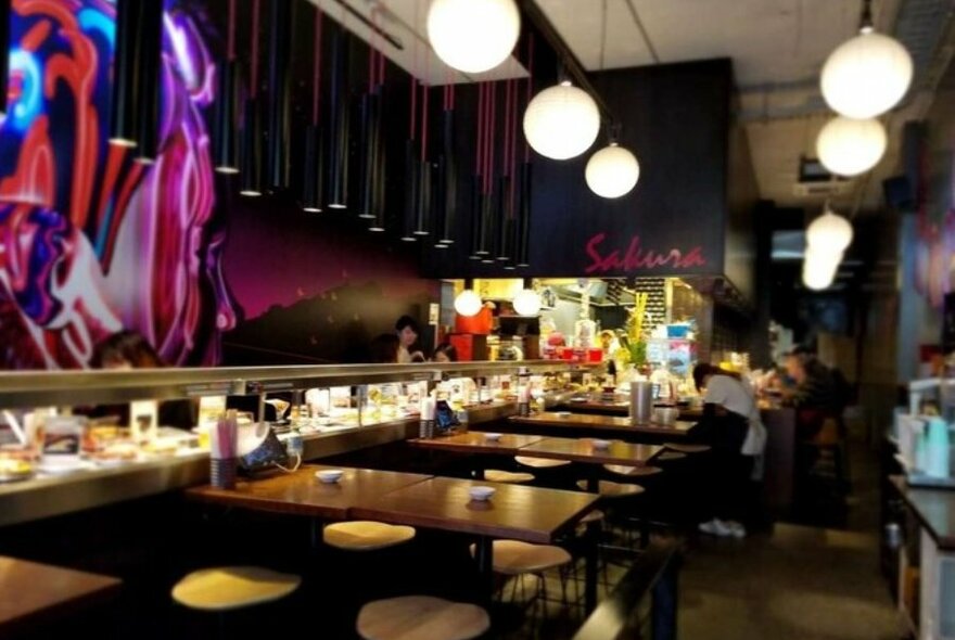 A Japanese sushi train restaurant