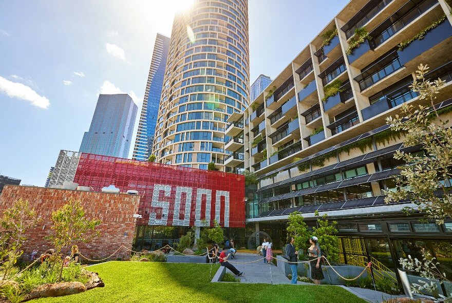 People are hanging out on a rooftop garden