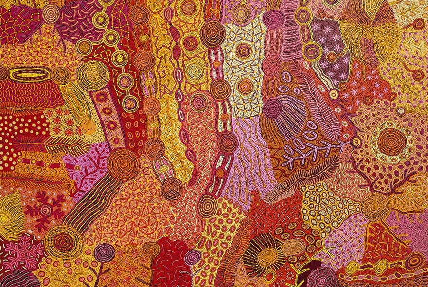 Indigenous dot artwork in ochres, pinks and yellows.