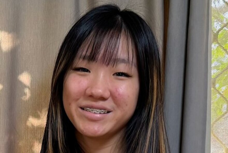 Portrait of young pianist Thea Lukito.
