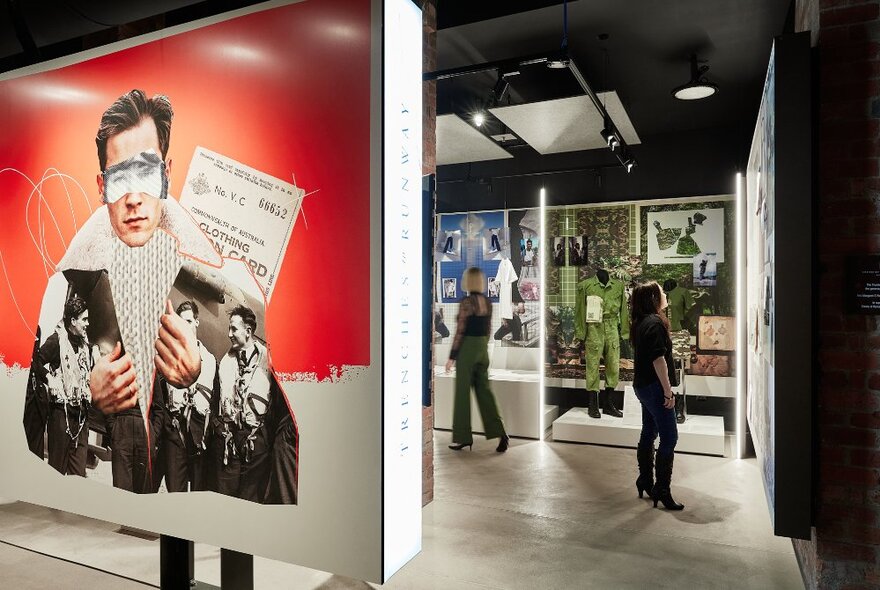 Displays at an exhibition showcasing military clothing.