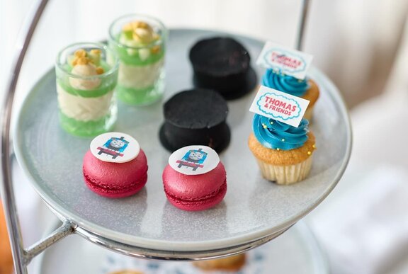A plate with Thomas the Tank Engine themed treats.