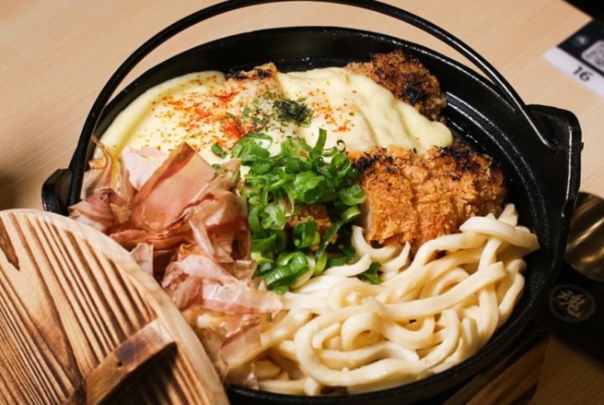 A bowl of Udon noodles.