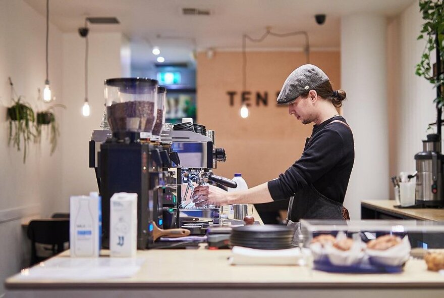 Barista making coffee.