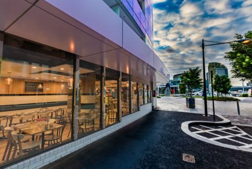 Exterior view of cafe with view of cafe tables.