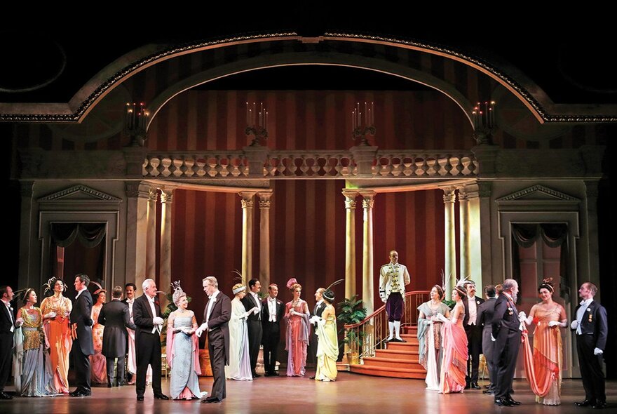 A ballroom scene from a production of My Fair Lady on stage.