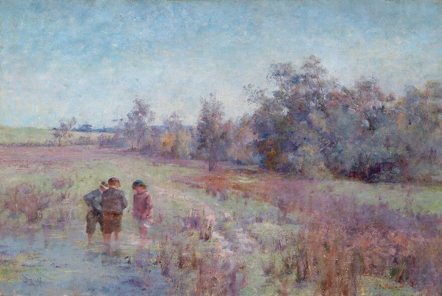 Impressionist style oil painting of three children standing knee deep in a creek in the bush looking surrounded by trees and creek banks, dating from the late 19th century.