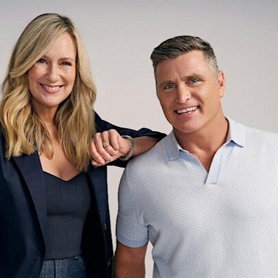 TV presenters Melissa Doyle and Shane Crawford, smiling and standing in front of a white background.