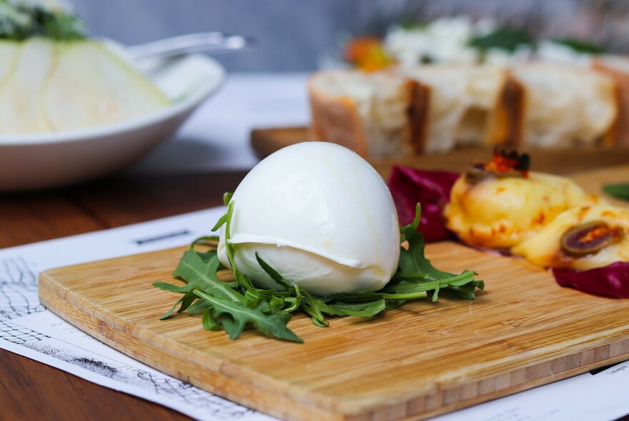 Buffalo mozzarella cheese ball and rocket.