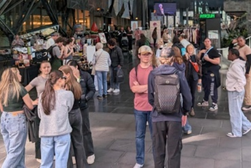 A crowd of people at Fed Square in Melbourne.