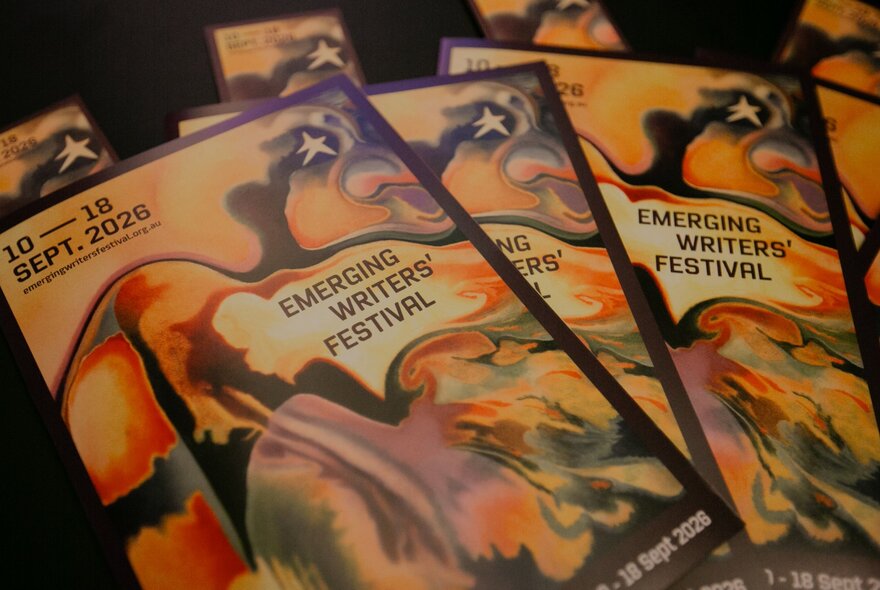 The printed programs for the upcoming Emerging Writers' Festival.
