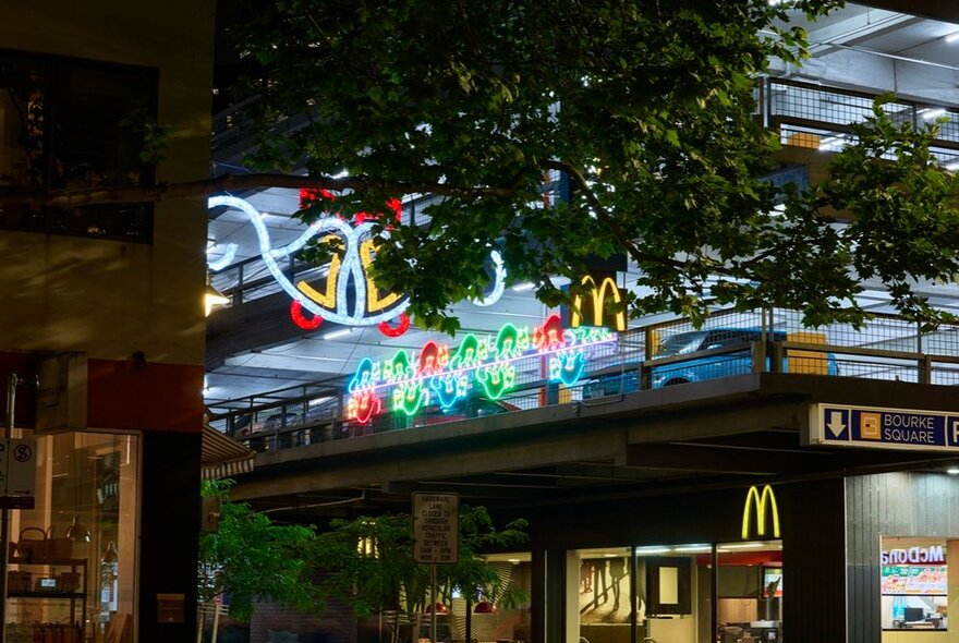 Light up display of twelve possums playing. 