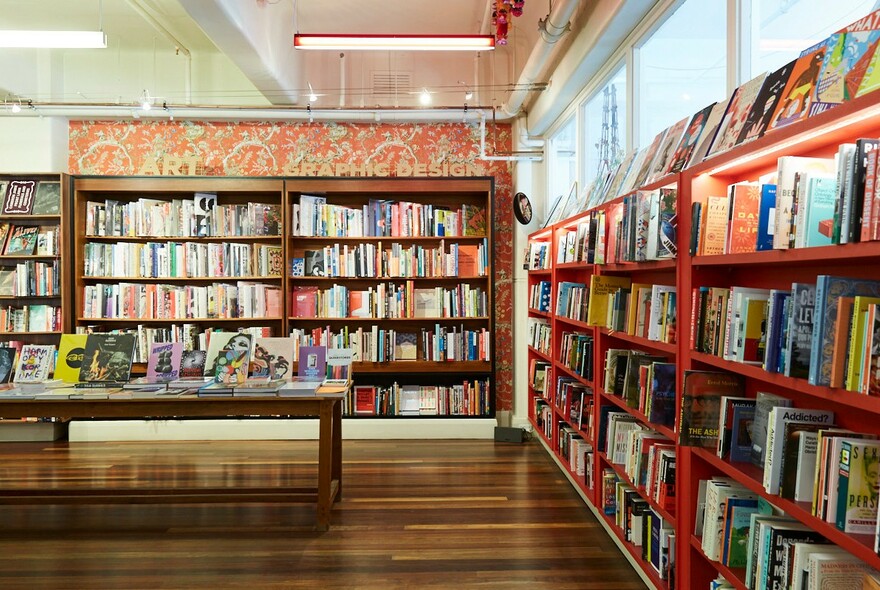 Books on shelves inside a bookstore.