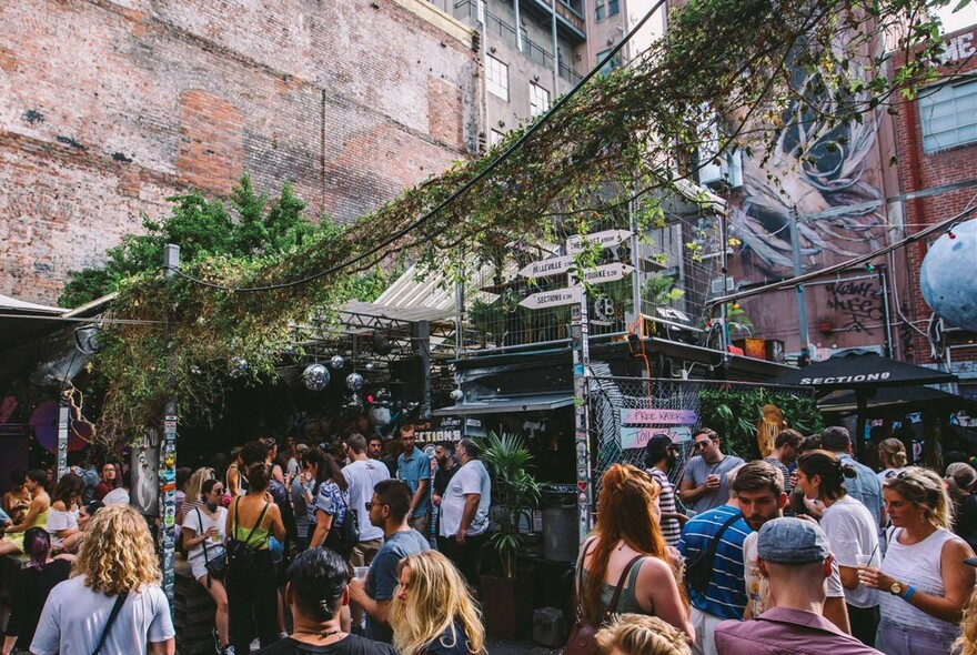 Crowded outdoor bar.