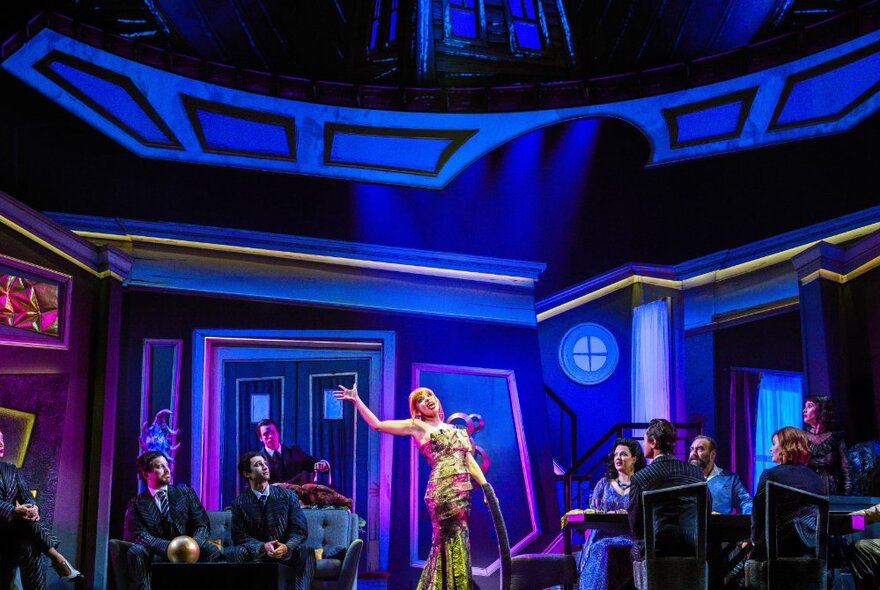 Theatre stage with the cast of Beetlejuice The Musical performing.