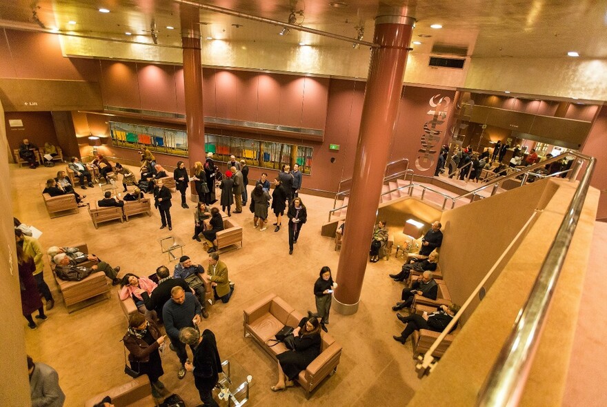 People mingling inside Arts Centre Melbourne complex.