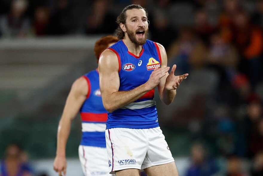 Bulldogs captain Marcus Bontempelli claps his hands during a match. 