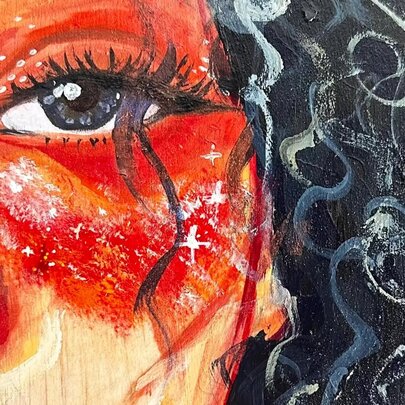 Detail of a portrait of a woman with red shaded features.